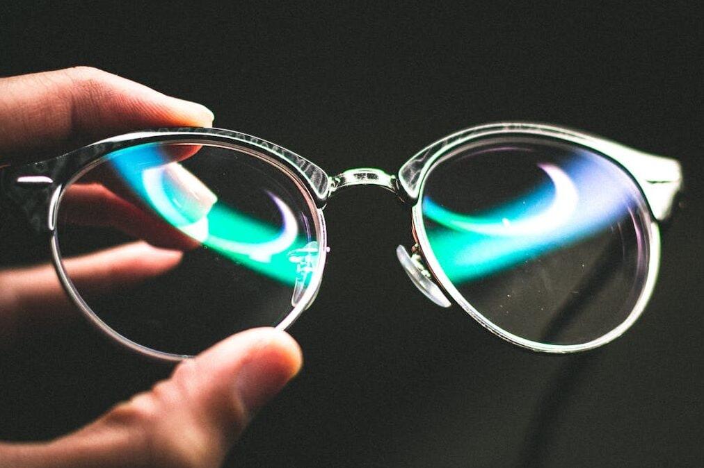 Ophthalmic lenses being prepared for AR coating